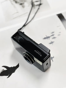 FUJIFILM Natura S Piano Black